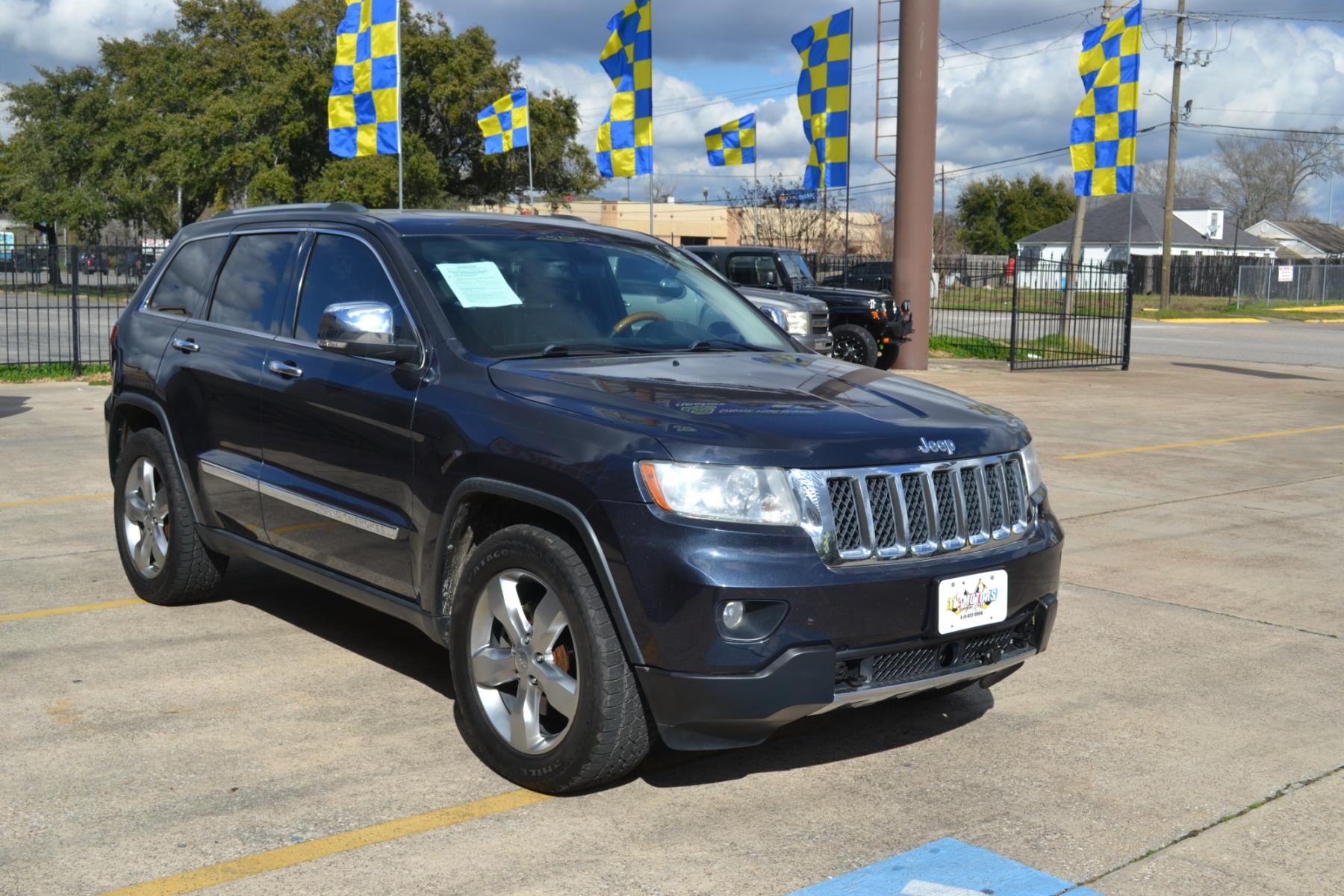 2013 Mineral Gray Metallic /Black Leather Interior Jeep Grand Cherokee Overland 4WD (1C4RJFCT1DC) with an 5.7L V8 OHV 16V engine, 5-Speed Automatic transmission, located at 1355 North 11th Street, Beaumont, 77702, (409) 832-0006, 30.094290, -94.130096 - Photo #6